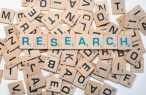 research spelled out with tiles