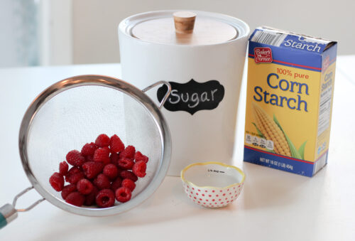 Ingredients needed to make raspberry sauce
