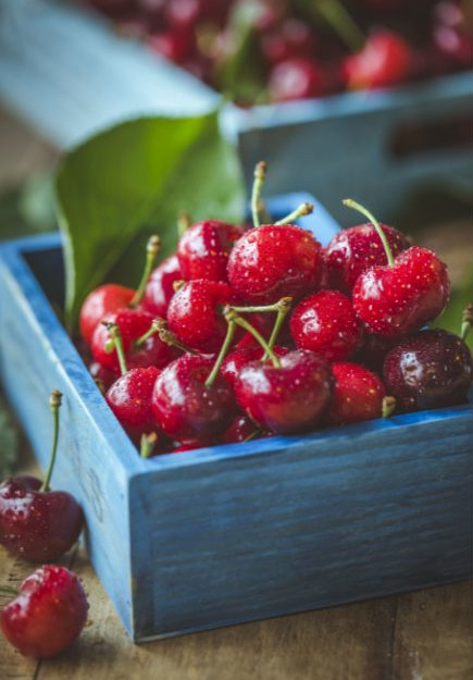 cherries in a blue box