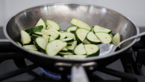 zucchini cooking in sauce pan