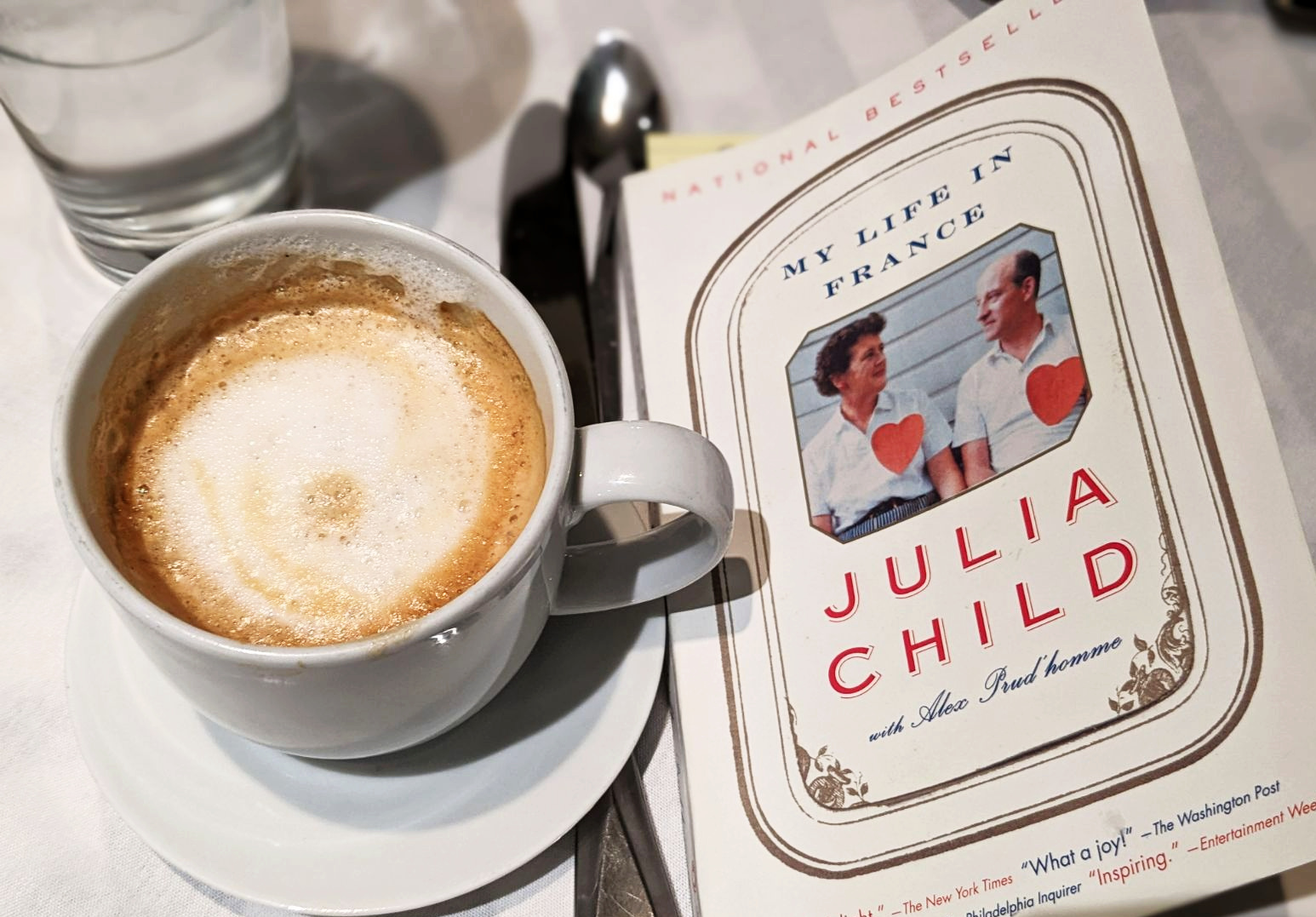 Latte next to "My Life in France" book